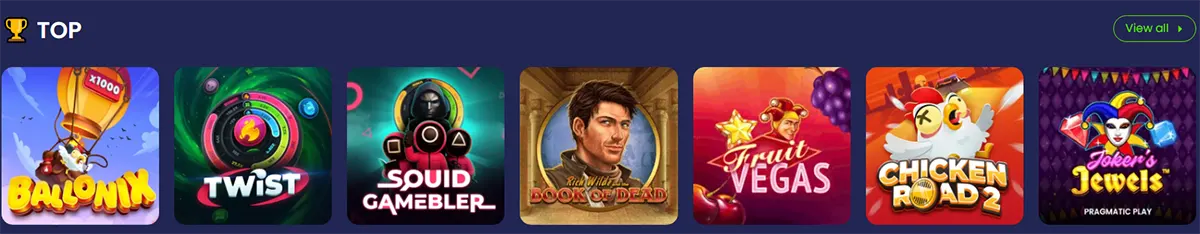 Carousel of “Top” casino games showing thumbnails for Ballonix, Twist, Squid Gambler, Book of Dead, Fruit Vegas, Chicken Road 2, and Joker’s Jewels with a “View all” button.